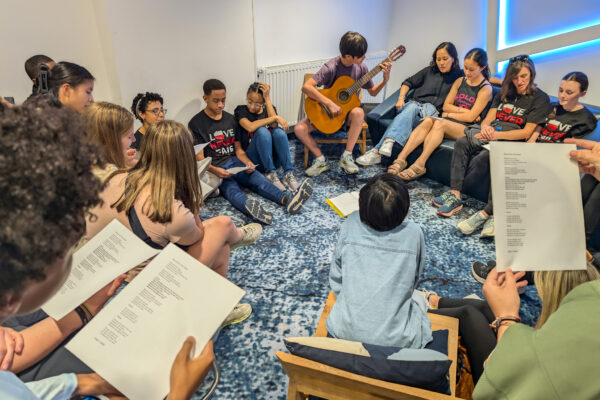 The ministry team practice music at a camp for Polish and Ukrainian youth (GO Poland)
