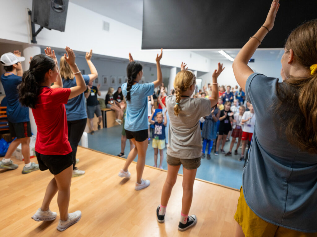 The GO Journey team leads worship songs at a camp for Polish and Ukrainian youth (GO Poland)