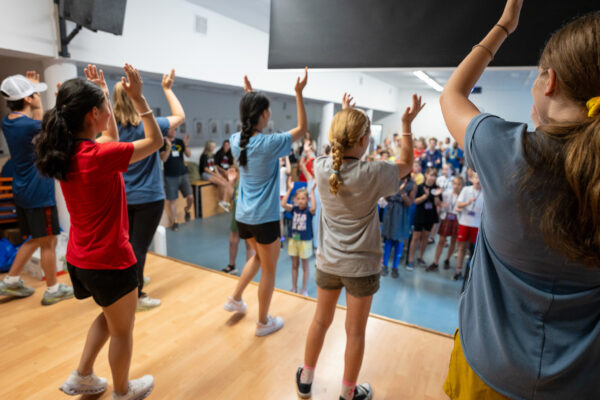 The GO Journey team leads worship songs at a camp for Polish and Ukrainian youth (GO Poland)