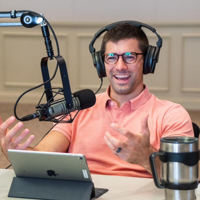 Teacher Caleb Click recording the Digging Deeper podcast