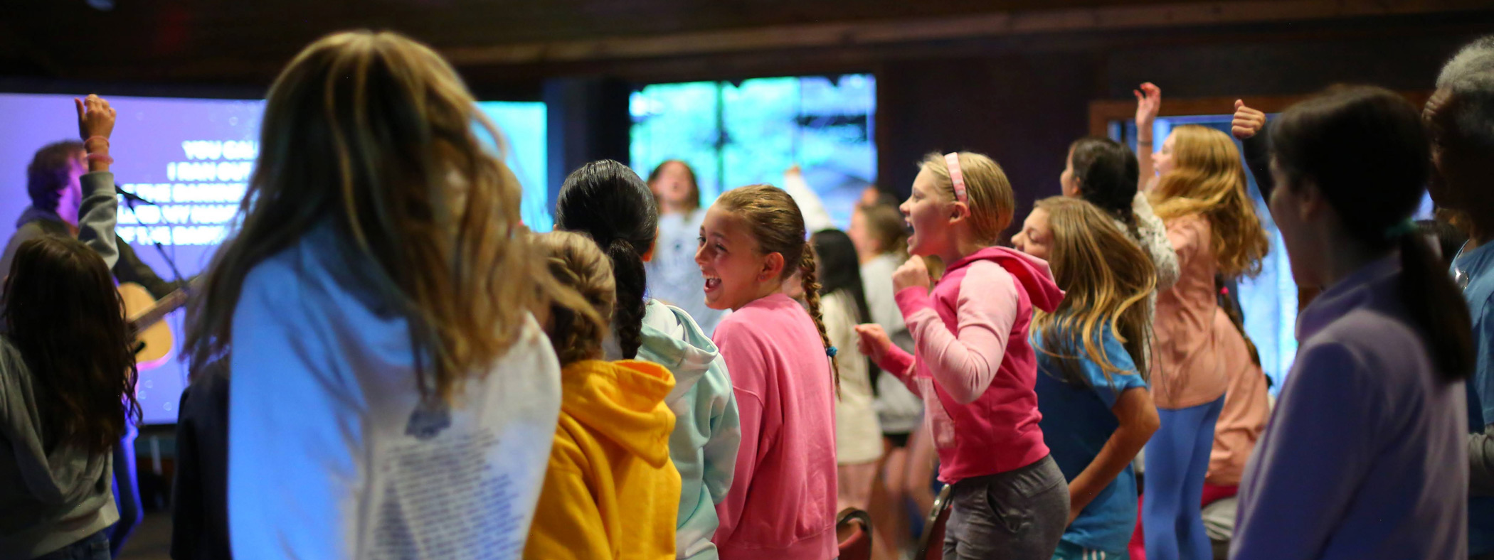 Students worshiping at the 5th Grade Thrive Retreat